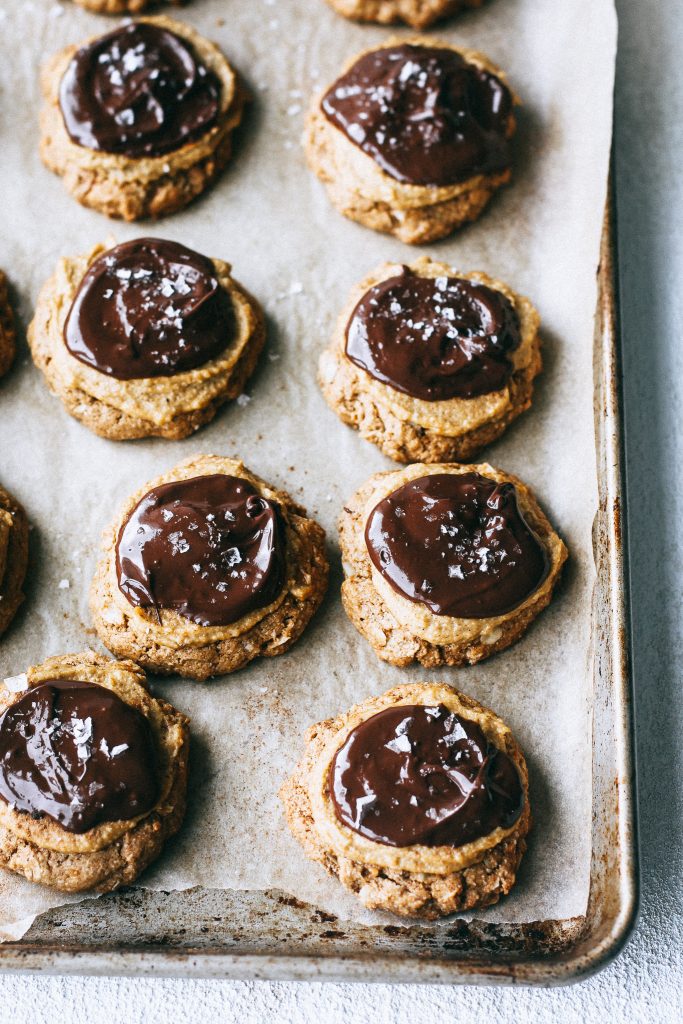 melty chocolate pumpkin cheesecake cookies on baking tray