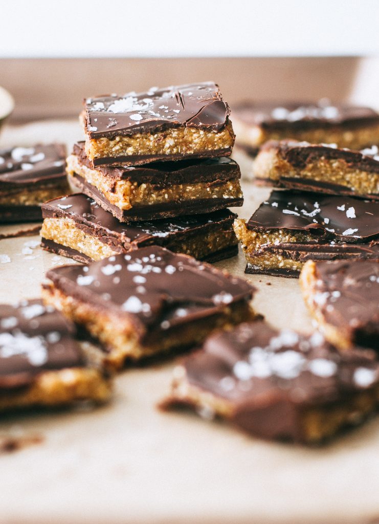 cookie dough chocolate bark stacked on top of each other 