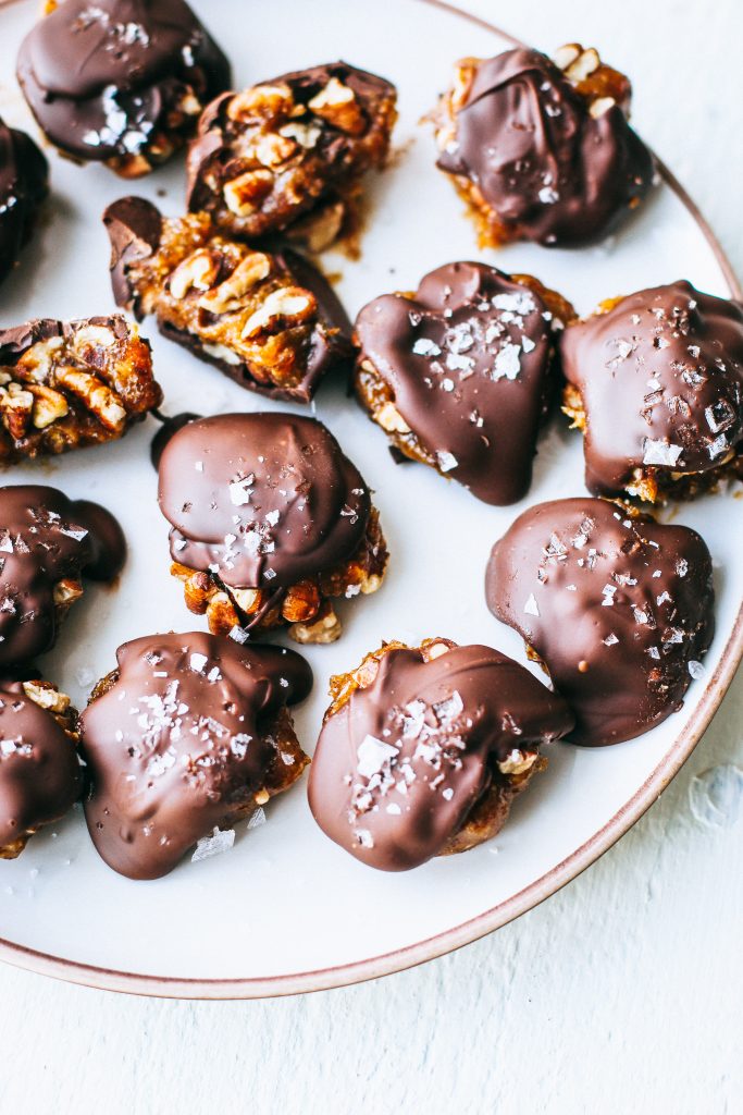 vegan chocolate turtle truffles on white plate