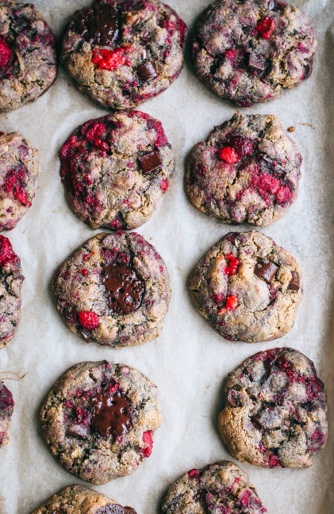 chocolate chip raspberry cookies on a baking sheet