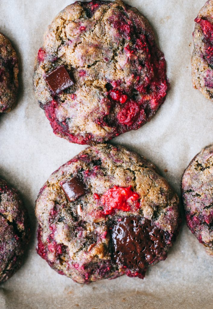 chocolate chip raspberry cookies on a baking sheet