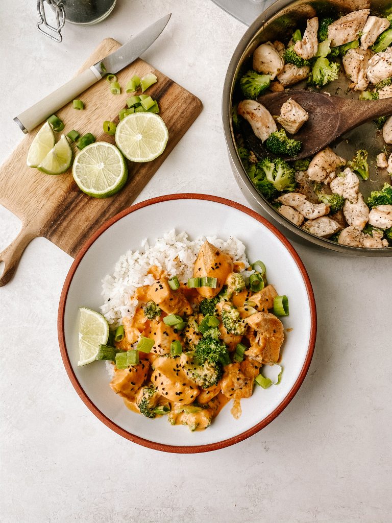 cashew curry chicken and broccoli with rice in a bowl