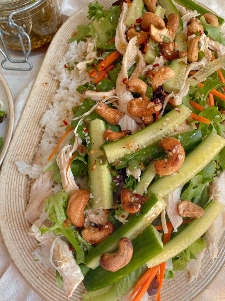 cashew chicken salad and rice on a platter