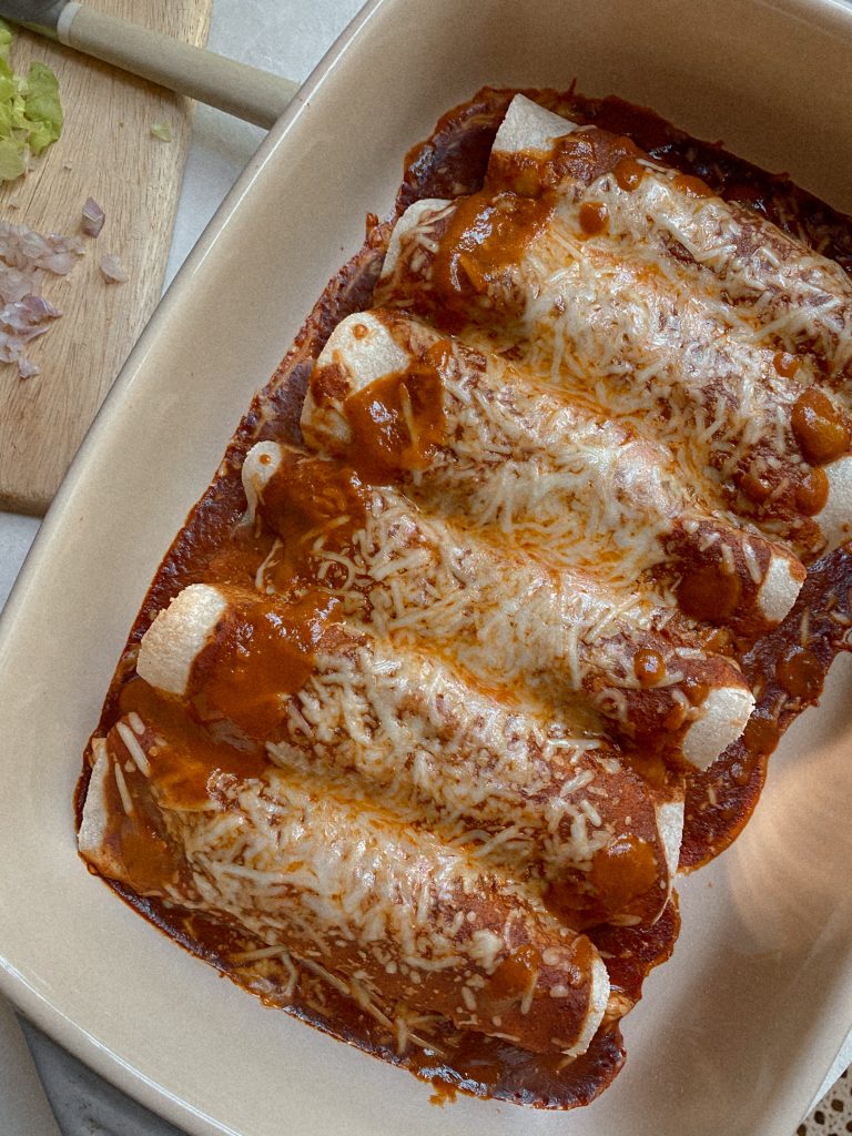 enchiladas in a baking dish 