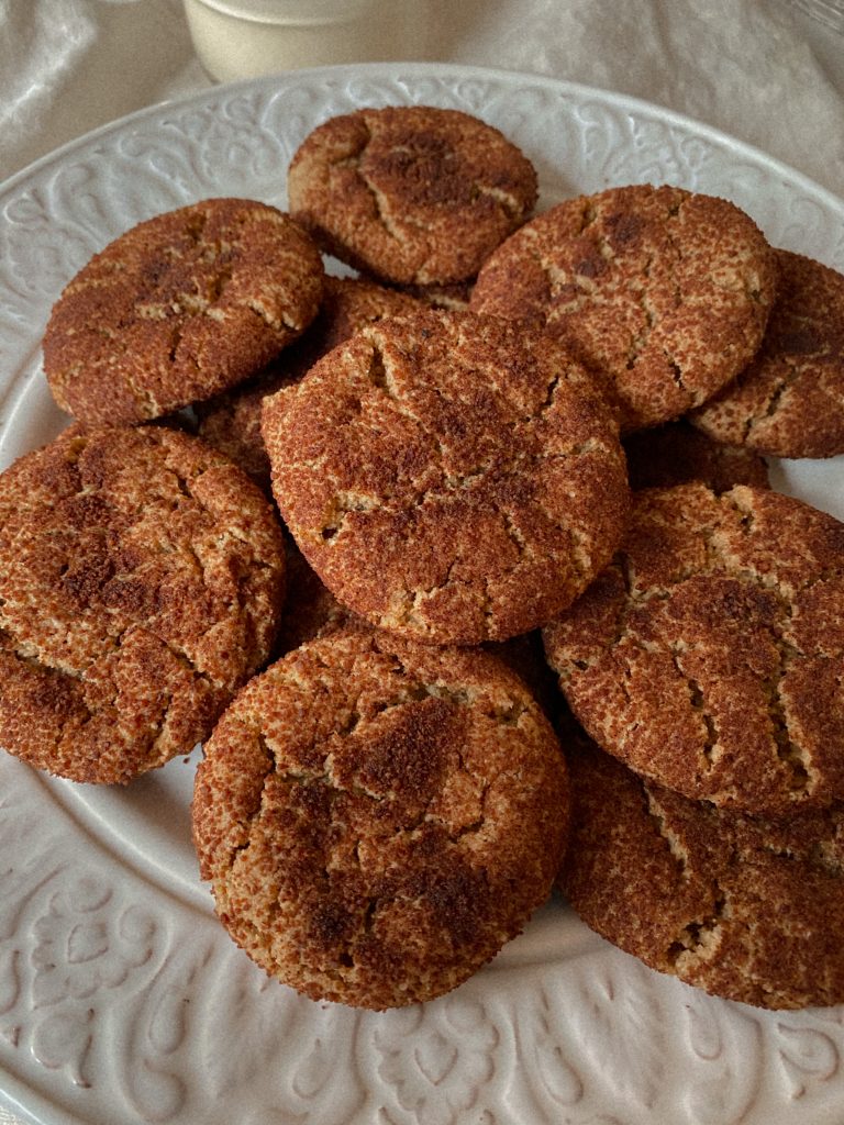 snickerdoodle cookies on a white plate